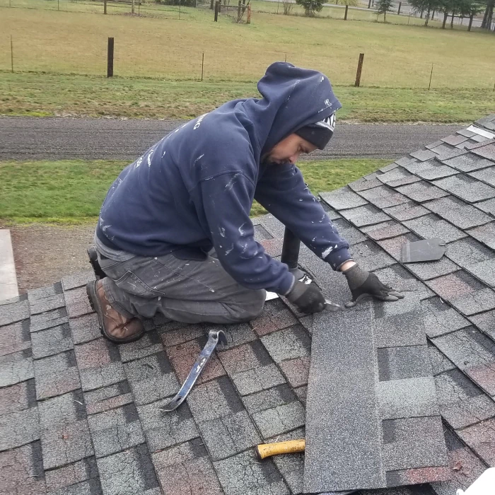 contractor working on roof replacement